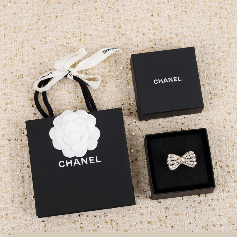 Ch*el brooches